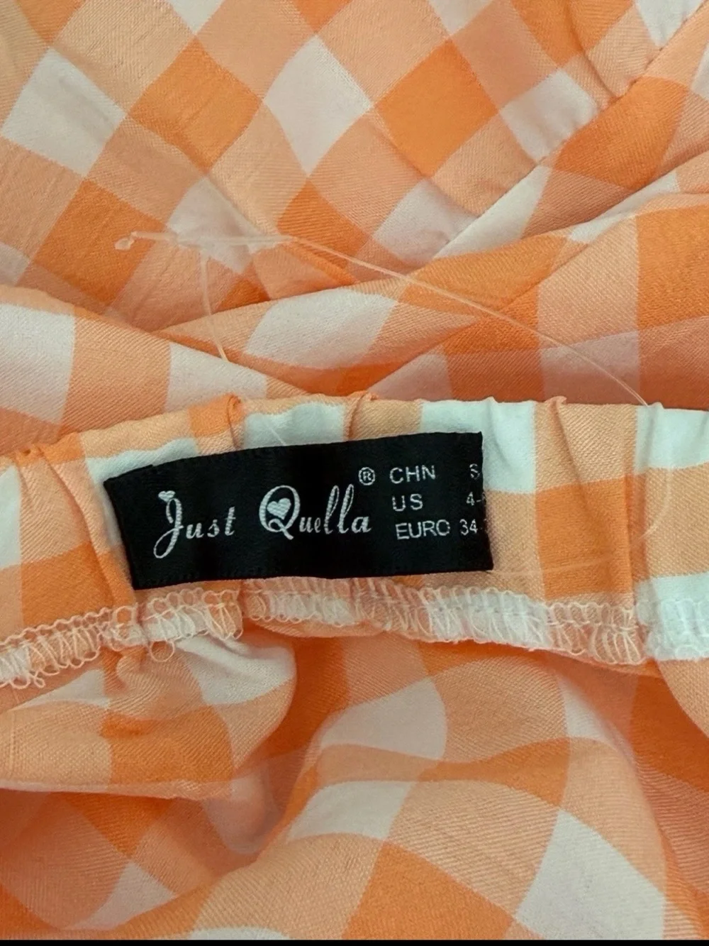 Girls Peach Gingham Smocked Sundress with Ruffle Hem